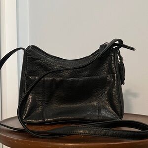 Rolfs black leather small zipper closure shoulder bag